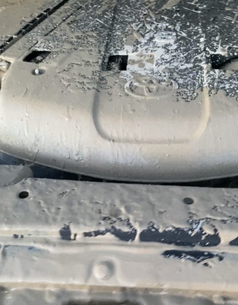 close-dirty-engine-bay