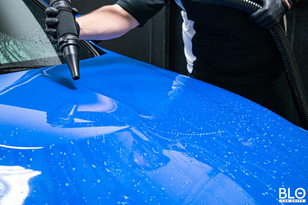 blowing water off the paint