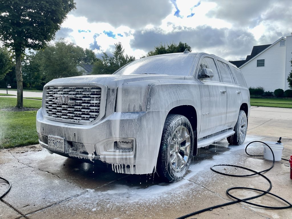 GMC Yukon covered in shampoo