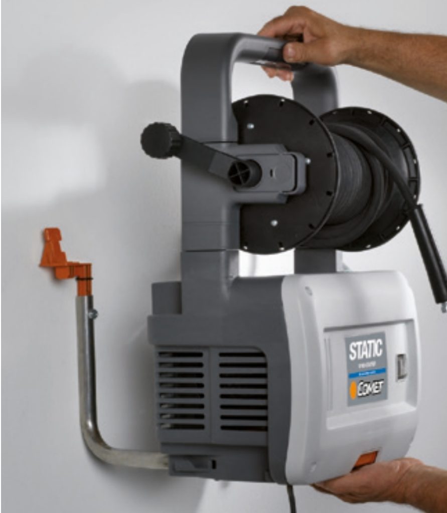 The Comet Static 1700 sliding onto the mounting bracket