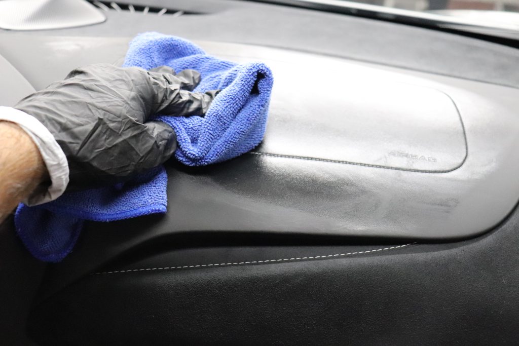 Using Gyeon Interior Detailer on the dashboard of a Mclaren 720S