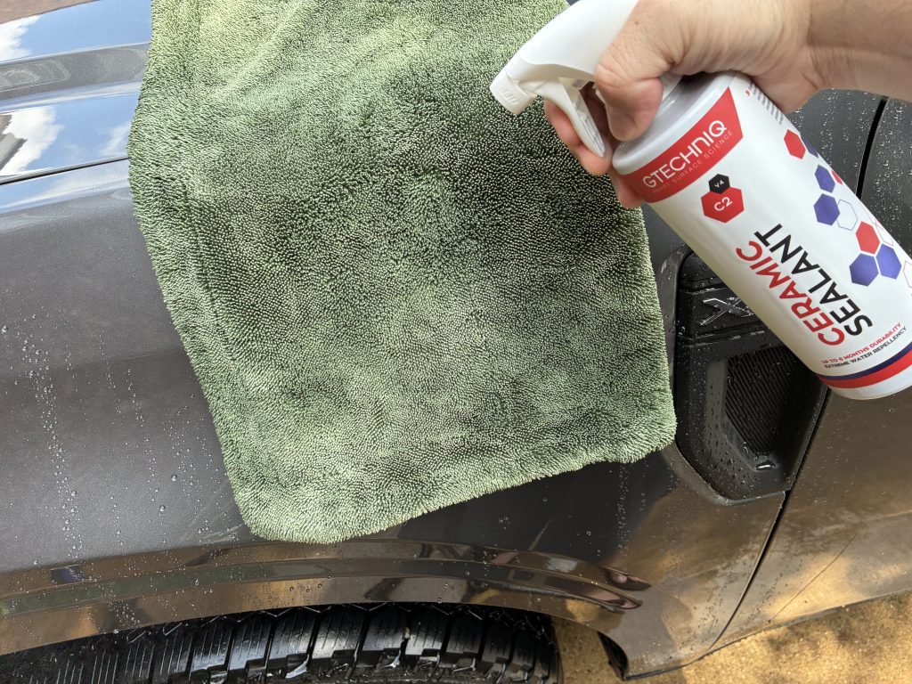 Spraying C2 onto Drying Towel