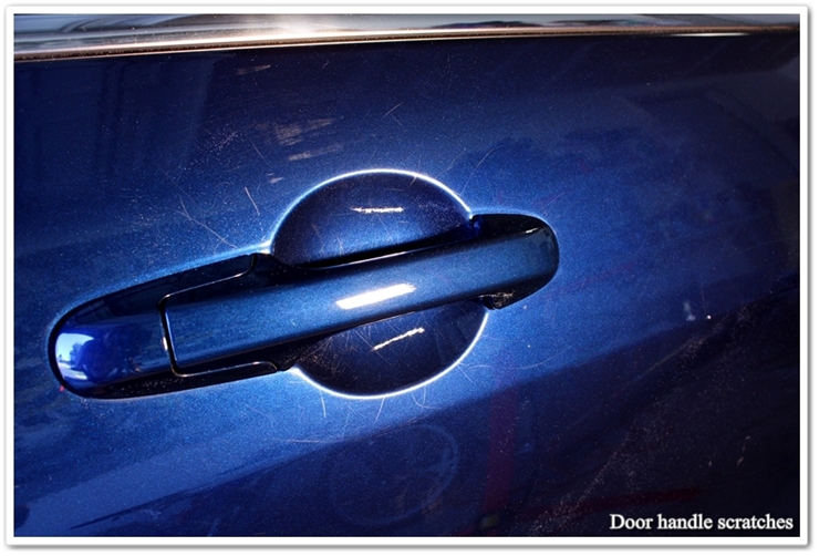 Scratches under the door handle before polishing with Meguiar's M105 polish by hand.
