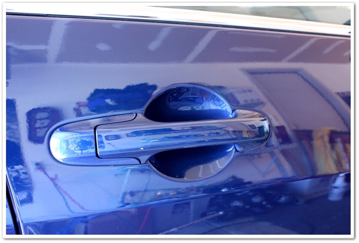 Scratches under the door handle after polishing with Meguiar's M105 polish by hand.