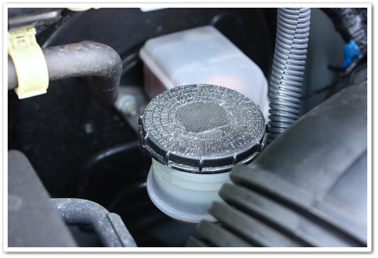 Before picture of an engine bay detail Before picture of an engine bay detail