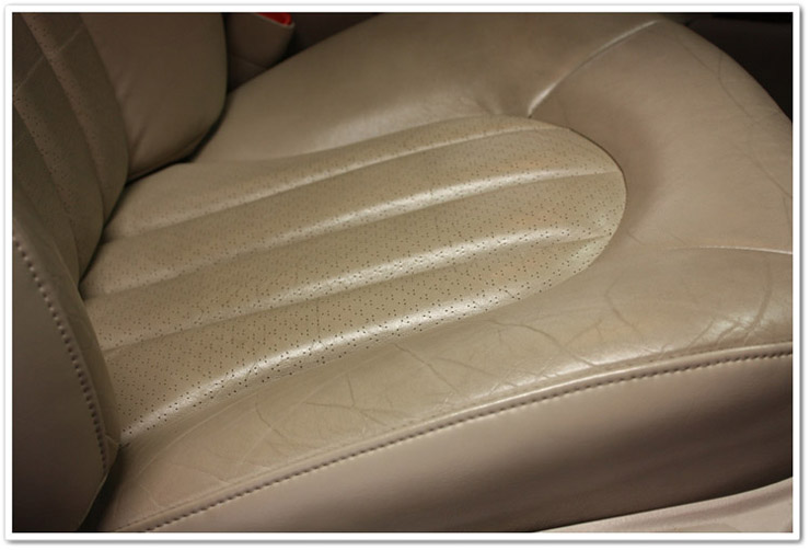 Leather passenger seat cracking before leather restoration using Leatherique Leather passenger seat cracking before leather restoration using Leatherique